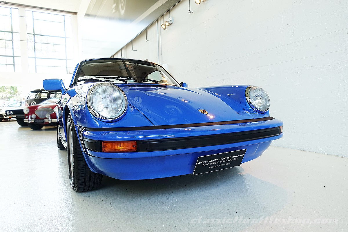 1976-Porsche-911-Arrow-Blue-1