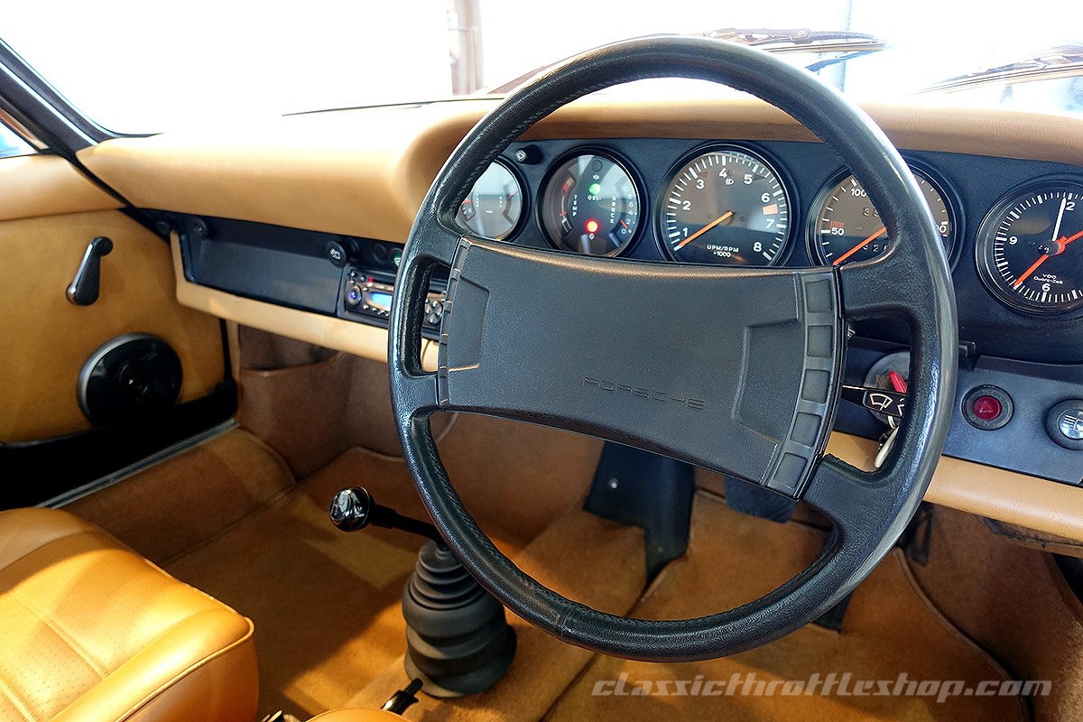 1976-Porsche-911-Arrow-Blue-34